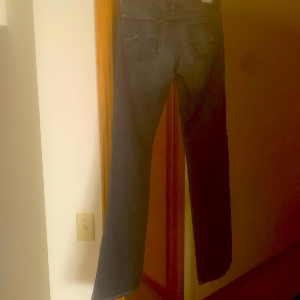 Size 25 boot cut dark colored jeans